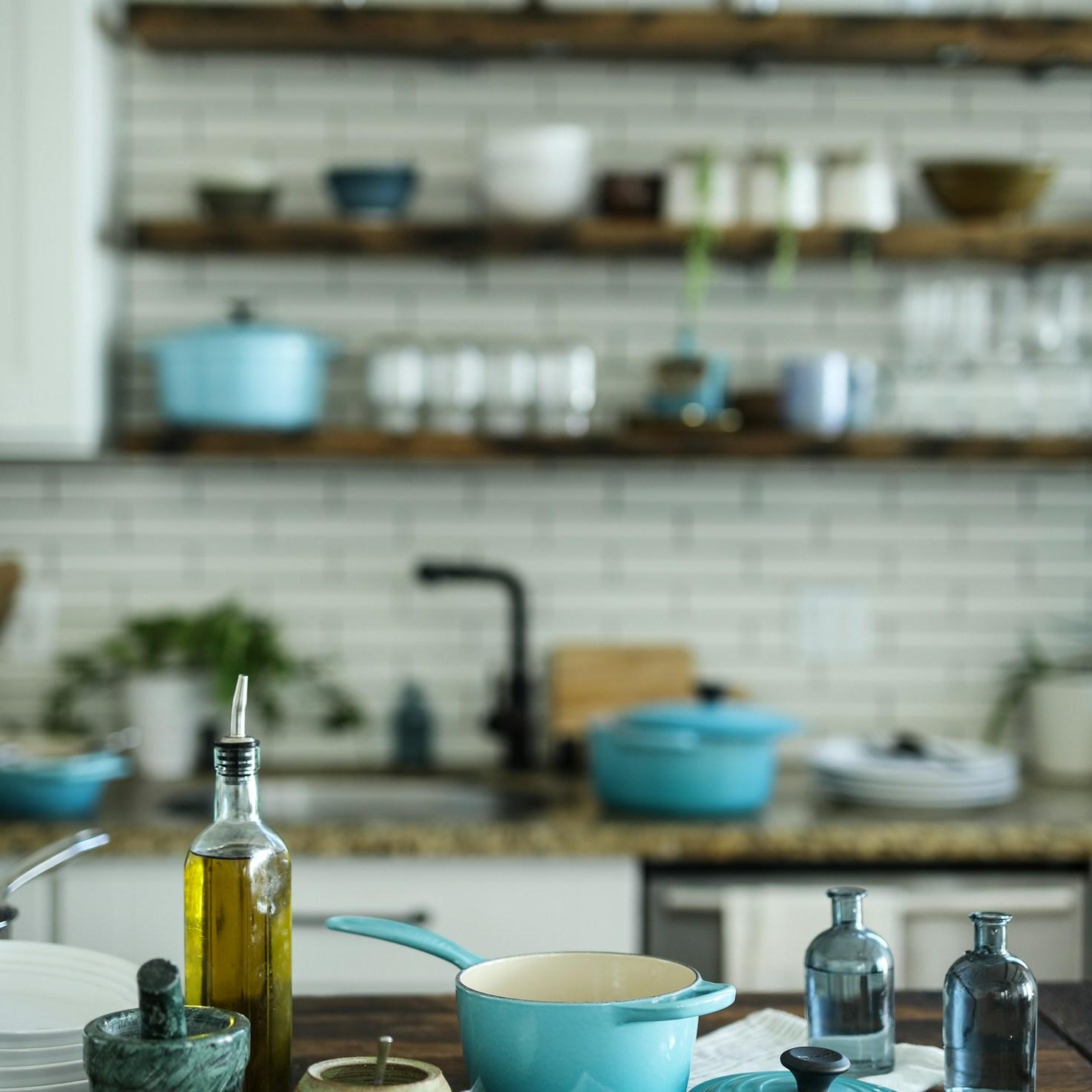 Community members collaborating in a modern kitchen space, sharing recipes and cooking techniques